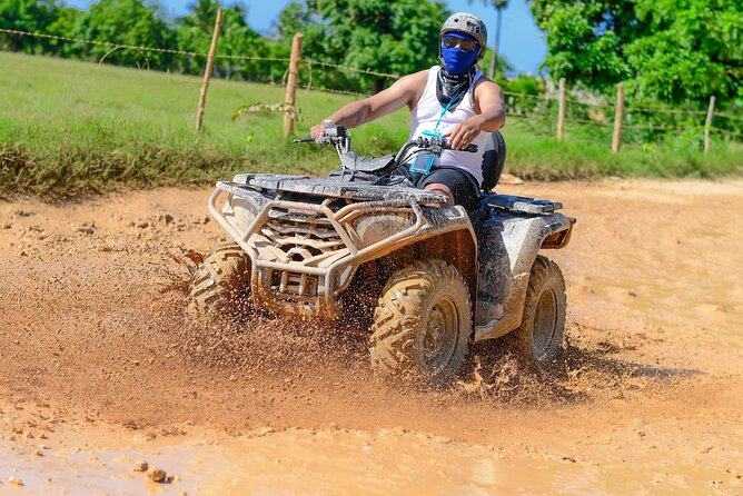 4X4 ATV adventure in Punta Cana to the cenote and Macao beach - Swimming inside Los Hoyos del Salado