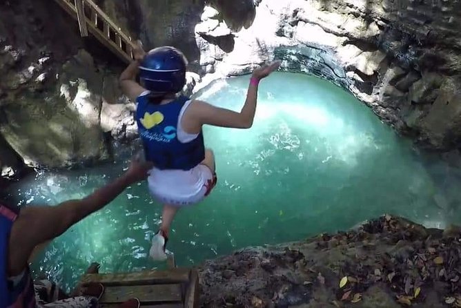 Amber cove and Taino Bay 7 Waterfall Zip lined & Dominican food - Zip lining through the jungle canopy