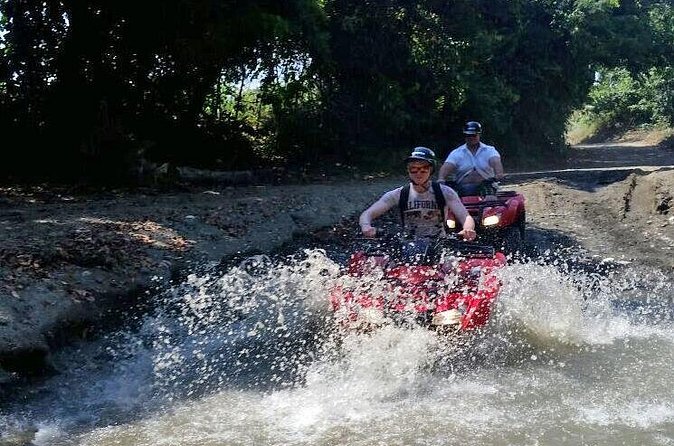 ATV Quads Let's Ride Shore Excursion - Amber Cove & Taino Bay - Returning in a safari-style vehicle with a rum drink