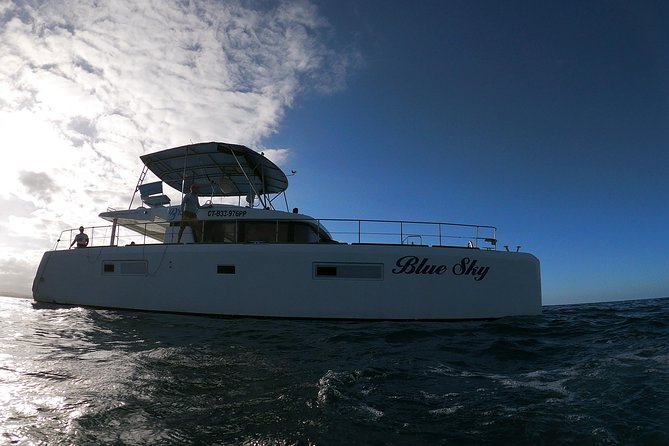 Catamaran Cruise with Snorkeling and lunch on board! - Boarding the Lagoon catamaran at Sosua Beach