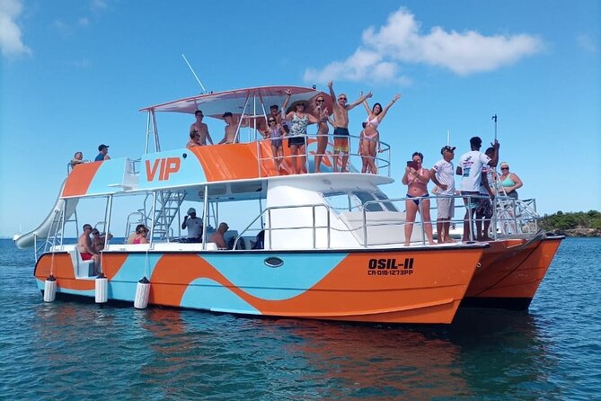 Catamaran Party Cruise with Snorkeling & BBQ - Boarding a small catamaran with a big social mood