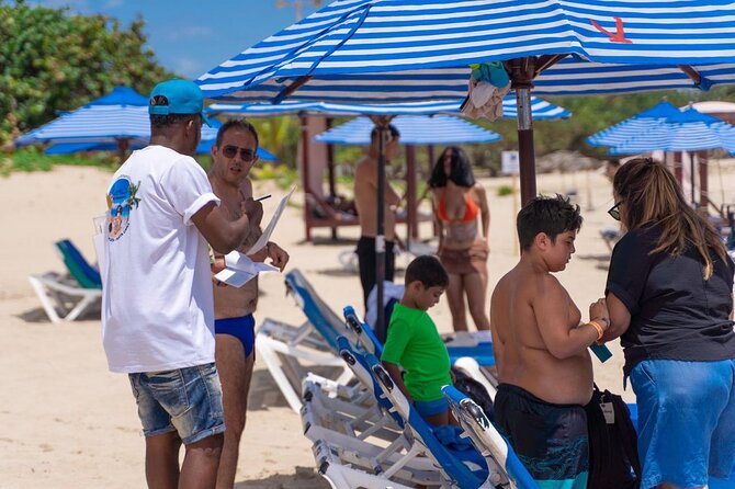 City Tour with Beach and Lunch Included - Puerto Plata boardwalk and the Neptune statue