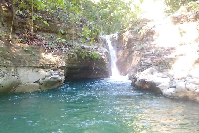 Damajagua Waterfalls Adventure Tour With Lunch Included - Reaching the water and handling the jumps