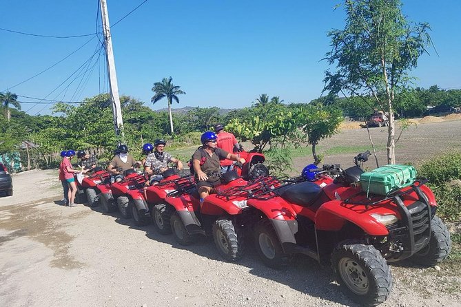 Four Wheels Drive/ATV'S Tour - A muddy ATV ride through fields and rivers