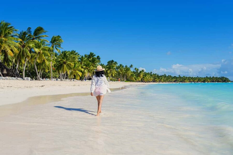 From Punta Cana: Catamaran Tour to Saona Island with Open Bar and Buffet - Boarding the boat and settling into the Caribbean mood