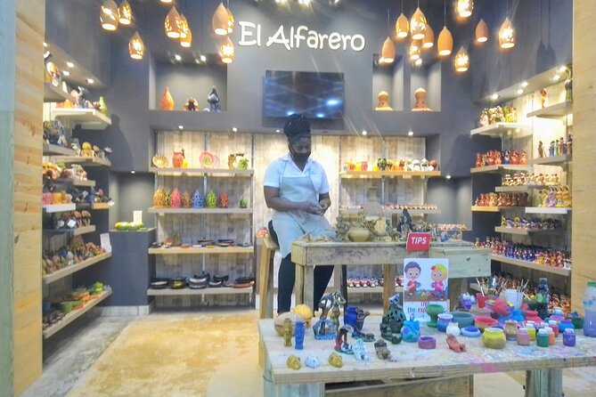 Guided Shopping Tour to Bella Mare Store (Cigars, Chocolate, Rum and Souvenirs) - Chocolate, Coffee, and Rum Make the Stop More Than a Gift Shop
