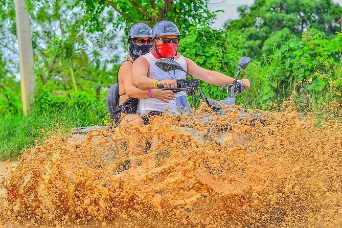 Half-Day Adventure 4x4 ATV, cenote and Macao beach in Punta Cana - Macao Beach, waves, and limestone cliffs