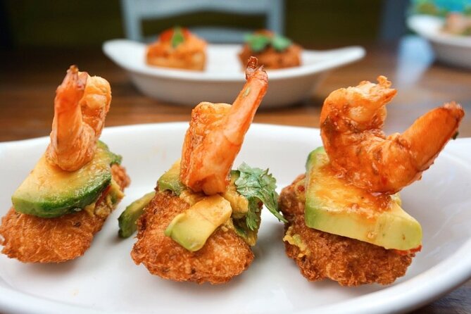 Half Day Punta Cana Food Tour Including Transportation - Stop one in Bavaro: Dominican appetizers with a local accent