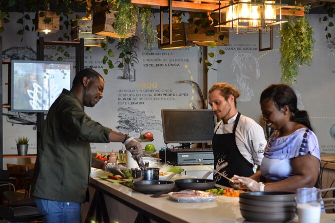 Learn How to Make Chillo al Coco & Taino Concept Store - Sitting down to eat the meal you made
