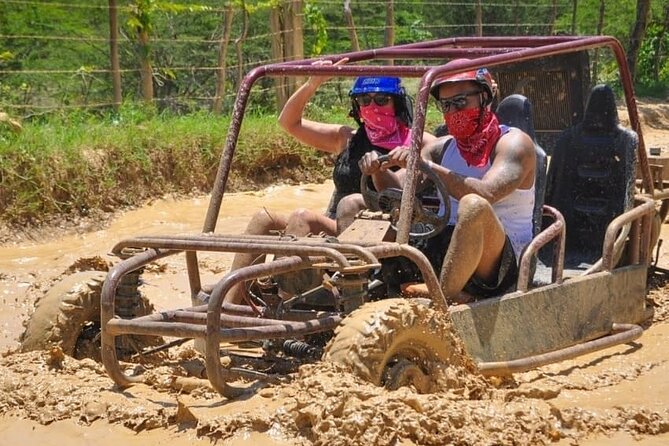 Macao Buggy Adventure & Cenote Splash – 4 Hours - Getting muddy on the farm tracks