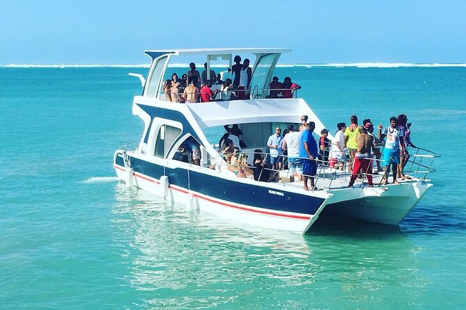Party Boat /View Dolphins / Snorkling /Free Drinks and Transportation - The snorkeling stop: fun, but keep expectations modest
