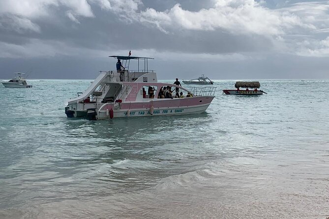 Private Party Boat with Slide and chicken skewers at Punta Cana - Food, drinks, gear, and transport are all covered