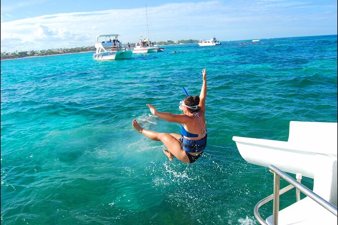 Private Party Boat with Slide and chicken skewers at Punta Cana - Who will enjoy the Pink Cat Punta Cana Party Boat