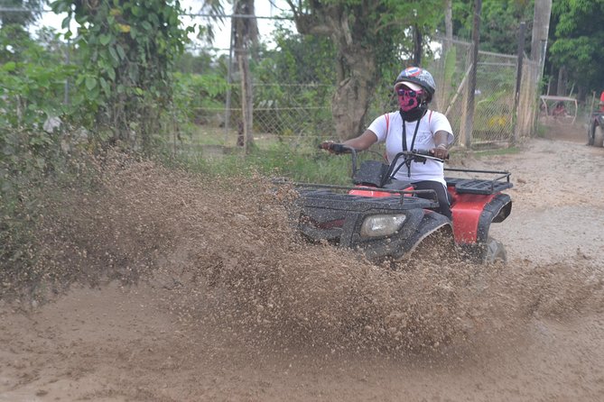 Punta Cana Adventure: Offroad 4x4 ATV - Cave and Macao Beach Dip - Riding the back roads outside Punta Cana