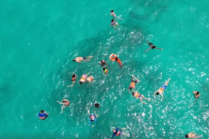 Punta Cana Boat Party Experience with Snorkeling & Natural Pool - Open bar, water, and the snack question