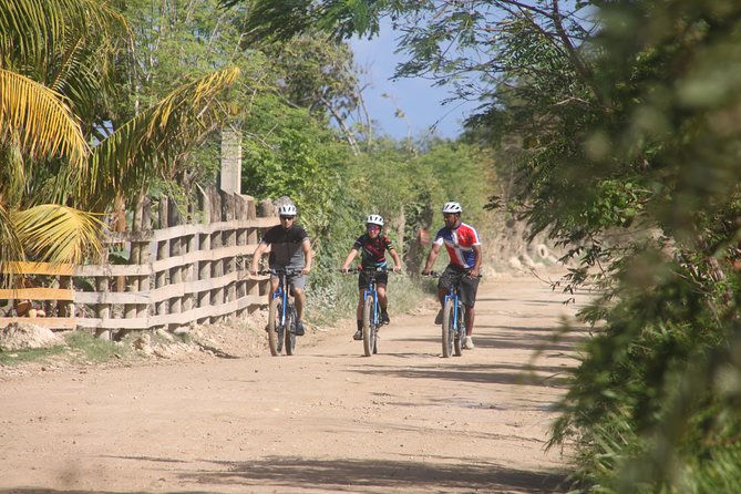 Punta Cana Mountain E-Bike Tour - Riding through farms, streams, and village roads