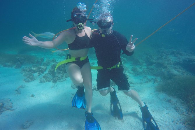 Punta Cana Party Cruise with Snorkeling, Hooka Diving and Parasailing - Boarding at Los Corales Beach and getting organized