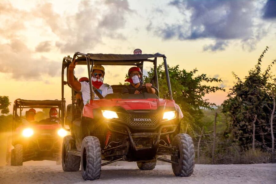 Punta Cana: Sunset Buggy Tour With Cave Swim and Dance Show - A cenote swim by torchlight