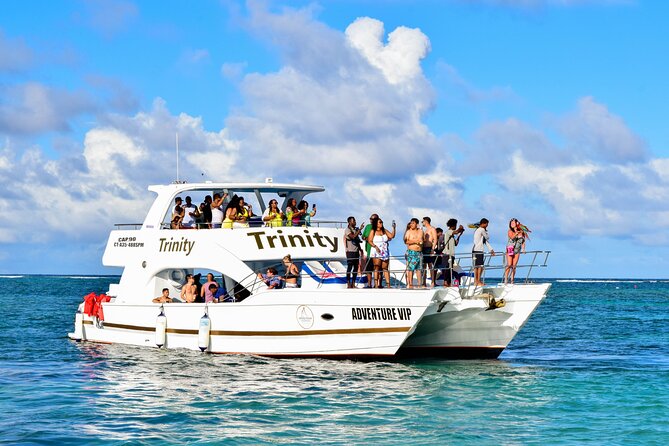 Punta Cana Ultimate Hip Hop Party Boat with Open Bar <em>Only Adults – Punta Cana Hip-Hop Party Boat at a Glance’ /></p>
<ul>
<li><strong>Adult-only format:</strong> The atmosphere is built for grown-up groups, couples, birthdays, and friends who want music and drinks without a family-cruise setting.</li>
<li><strong>Four music styles:</strong> Expect Hip-Hop, R&B, Dancehall, and Afro Beats rather than a standard tropical playlist.</li>
<li><strong>Three water settings:</strong> Swim and snorkel, cruise near Dolphins Island, then stop at a lively sand bar for dancing in waist-deep water.</li>
<li><strong>Open bar included:</strong> Alcoholic drinks, snacks, and fresh tropical fruit are part of the package.</li>
<li><strong>Hotel pickup offered:</strong> Your day begins with a transfer to the pier, though exact pickup details should be confirmed when booking.</li>
<li><strong>Personal service matters:</strong> Wendy is praised for photography, while Livens and Woovens are repeatedly noted for friendly, attentive hosting.</li>
</ul>
<h2 id="the-party-starts-before-the-boat-leaves">The Party Starts Before the Boat Leaves</h2>
<p><img width="669" height="446" decoding="async" src=