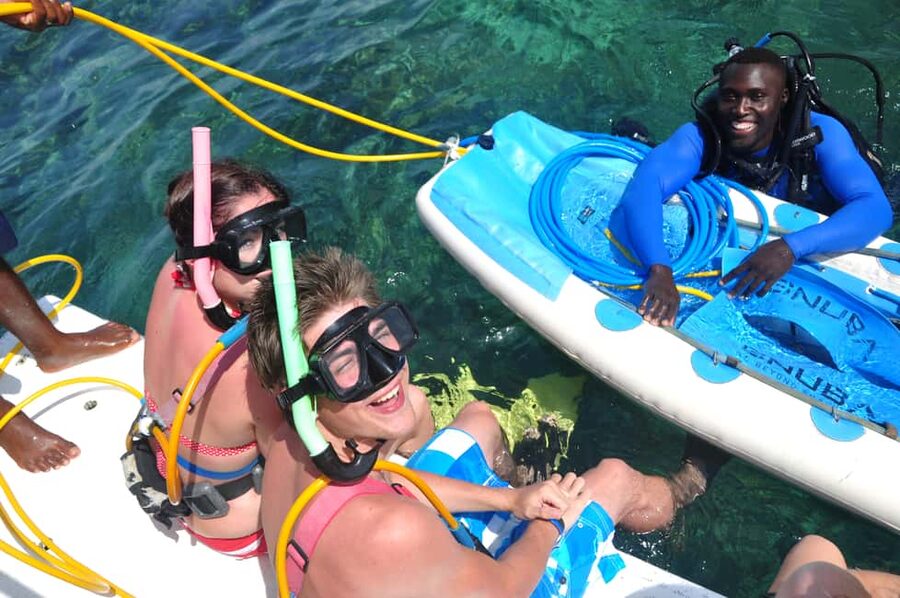 Sailing Splash Tour Speedboat, Snorkel, and Catamaran - A catamaran ride that rounds out the morning