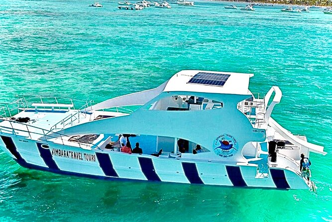 Sand Bar Punta Cana, Snorkeling, Party Boat, Booze Cruise Party - Passing Dolphin Island and watching for wildlife