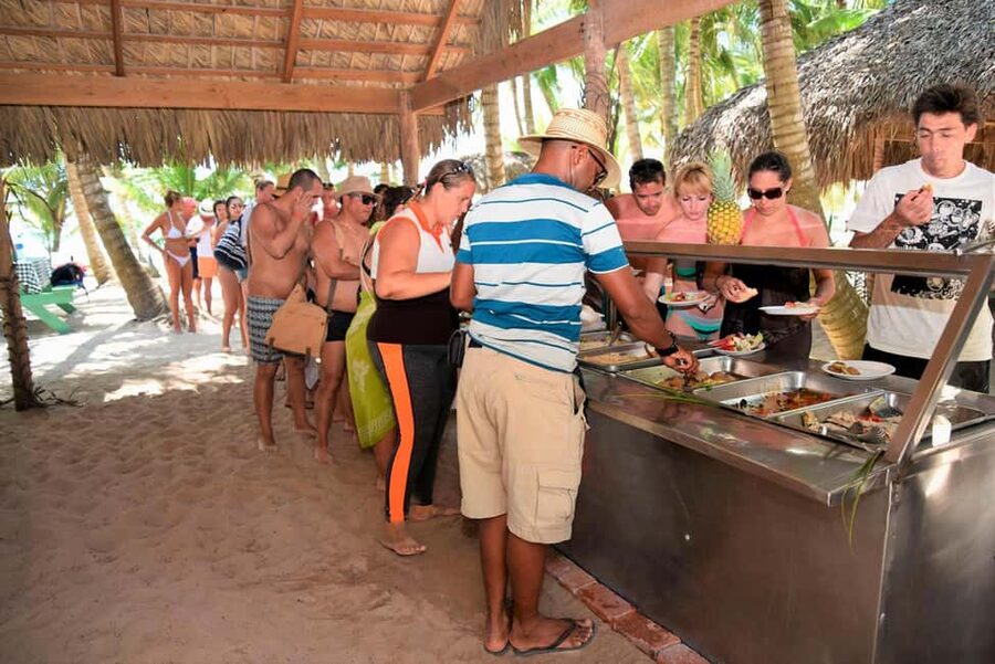 Saona Island from Punta Cana Day Trip with Open Bar - Playatao Beach and your reserved table