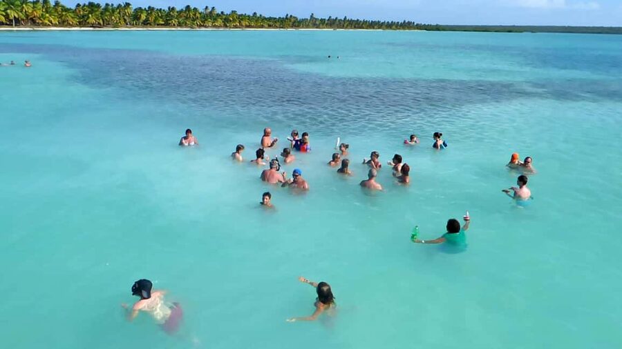 Saona Island Tour From Santo Domingo with Lunch and Pickup - Bayahibe and the first boat ride