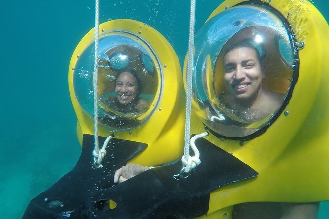 Scuba Doo Diving Scooters in Punta Cana - The glass-bottom boat adds a calmer view
