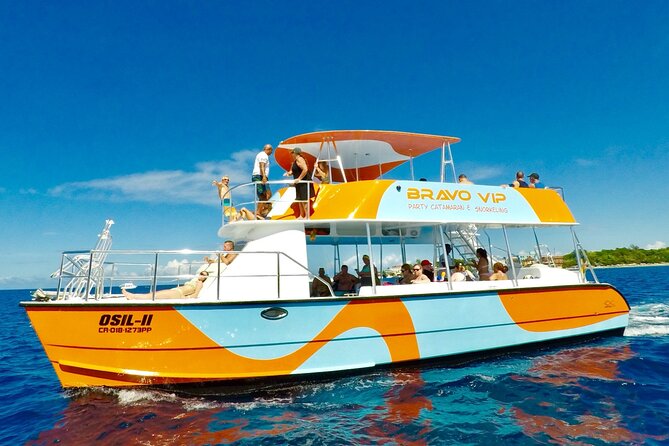 VIP Party Boat & Snorkeling - Passing Dolphin Island and the animal tank