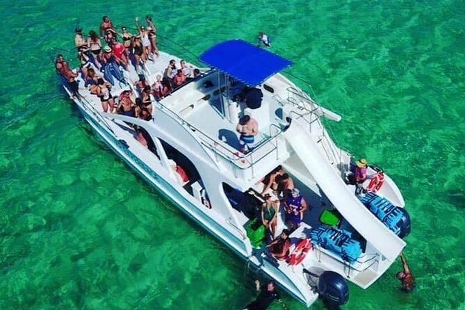 VIP Private Booze Cruise with Live Dj and BBQ in Punta Cana - BBQ, seafood, fruit, and local drinks