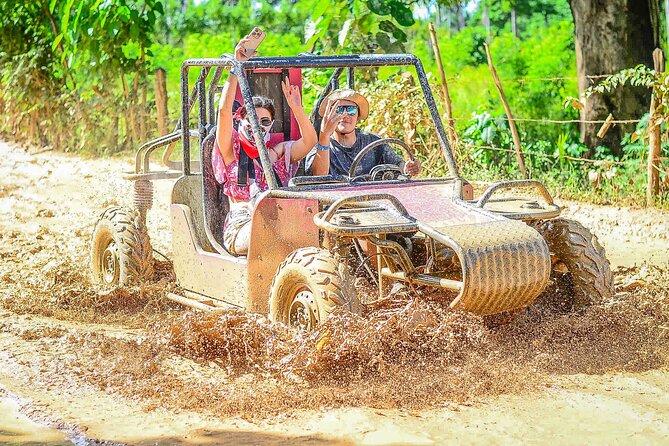 Wild Dune Buggy Ride Off-Road Cave & Mud Adventure in Punta Cana - Cooling off in the clear-water cenote